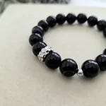 Black Botswana Agate Bracelet with Flower Charm - Image 2