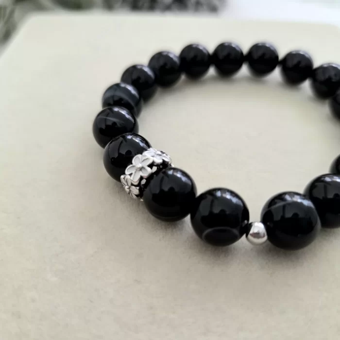 20250509_100111 Black Botswana Agate Bracelet with Flower Charm - Image 2