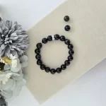 Black Botswana Agate Bracelet with Flower Charm - Image 6