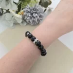 Black Botswana Agate Bracelet with Flower Charm - Image 4