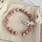 Rhodonite Bracelet with Rabbit Hair Fluorite Spacer & Flower Charm - Image 5