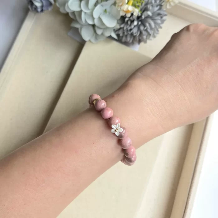 20250514_172023 Rhodonite Bracelet with Rabbit Hair Fluorite Spacer & Flower Charm - Image 4