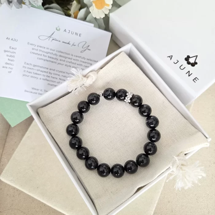 20250515_105408 Black Botswana Agate Bracelet with Flower Charm - Image 3